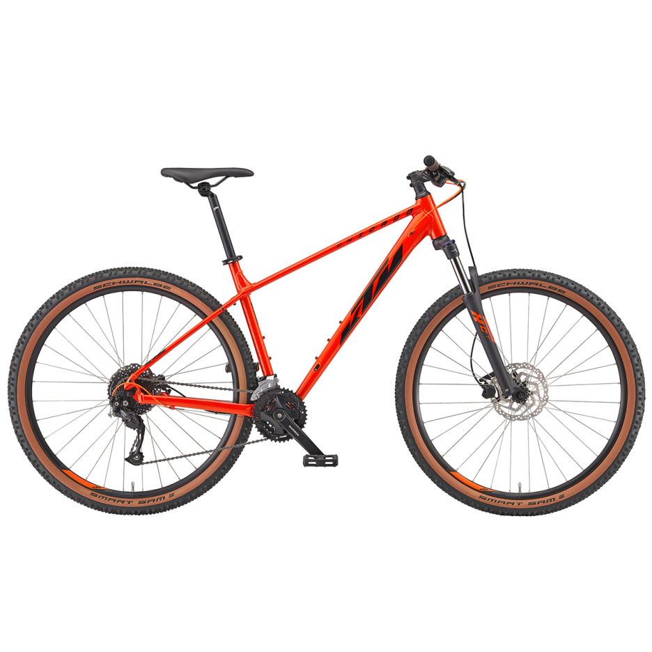 Bicicletă MTB KTM Chicago 291 culoare portocaliu, roți 29 inch, cadru aluminiu hardtail cu furcă suspendată Suntour, vedere laterală